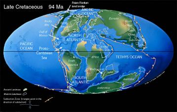 Cretaceous Continents: Christopher Scotese's reconstruction of the continental arrangement 94 million years ago.  The land bridge between North America and Asia is indicated at the upper left.  The connection between North and South America is also visible.  Africa is drifting away from other southern continents, but Australia, Antarctica and South America are linked.  Africa split off from this southern supercontinent beginning around 140 million years ago.