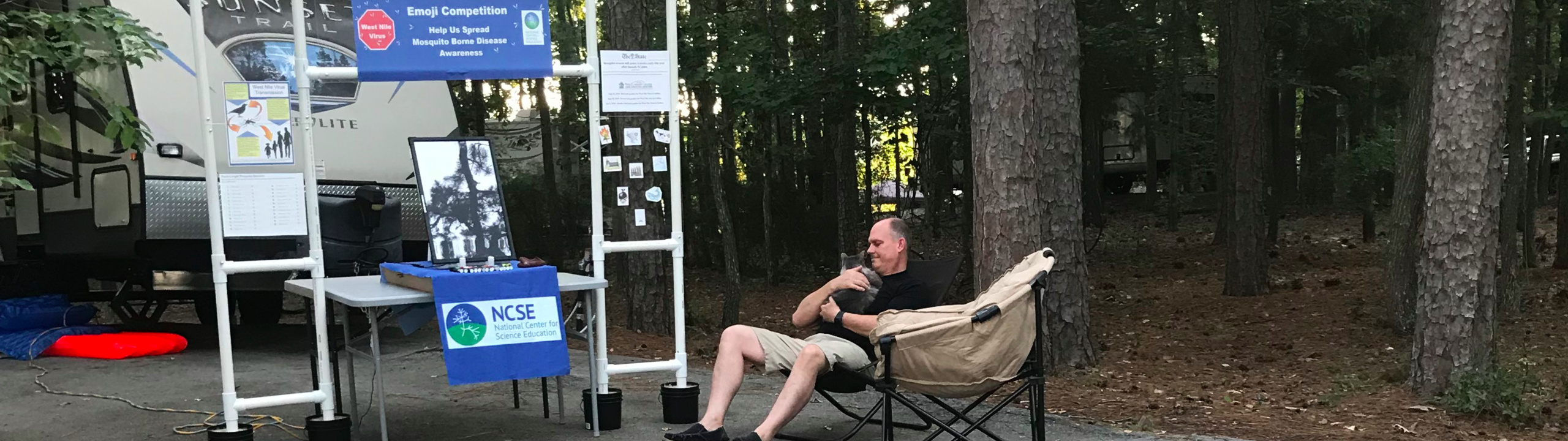 Setting up science outreach at a campground.