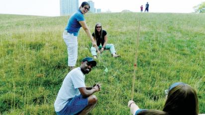 Teachers measuring sea level.