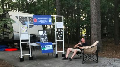 Setting up science outreach at a campground.