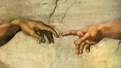 A closeup of Michaelangelo's The Creation of Adam