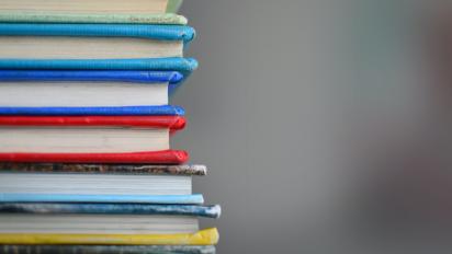 School books in a pile.